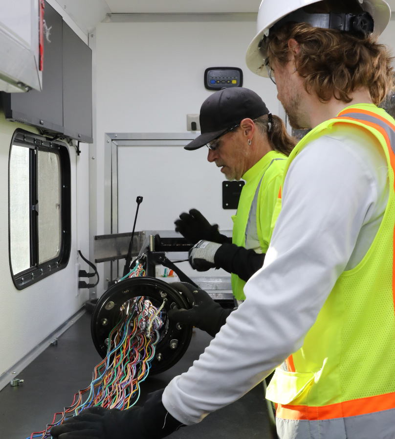 Tak Workers Repairing Cable