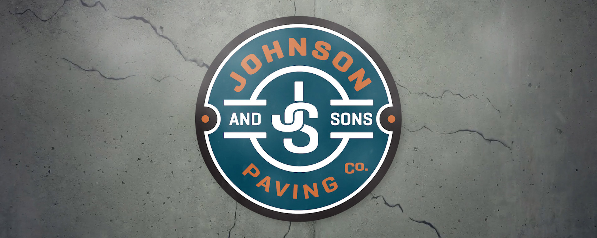 Johnson And Sons Logo On Asphalt Background